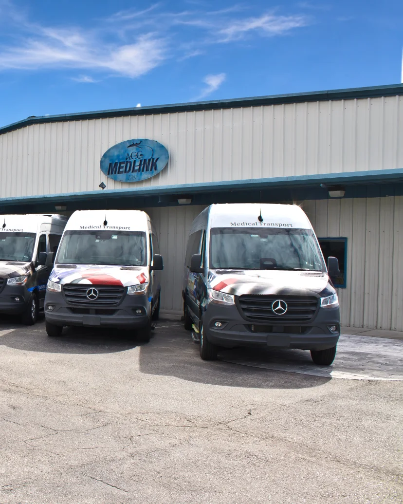 ACC Medlink's own Mercedes Sprinter fleet parked outside the company base