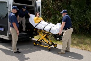 Client being loaded into Sprinter van with Stryker Power Pro XT Stretcher